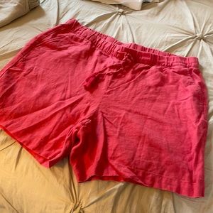 Women’s orange shorts.